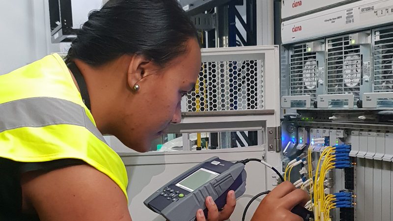Avaroa Cable's Systems Engineer Tania Apera making final checks in the Manatua Cable Landing Station in Rarotonga